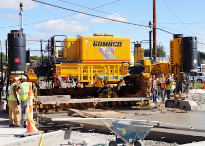 E&F Paving is using a GOMACO GP3 slipform paver, which is capable of paving up to 30 ft. and accommodating multiple width changes.