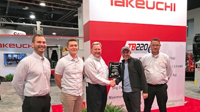 Executives from Feenaughty Machinery Company receiving the Takeuchi Dealer of the Year Award