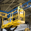 Vertical surroundings should also be considered, and operators should be sure to look upward for obstacles while elevating the work platform.