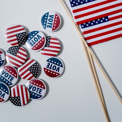 American Flags And Pins On White Background 4669109