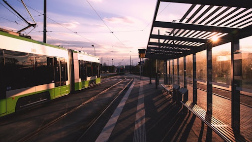 Green And White Train Near Train Terminal During Daytime 90550