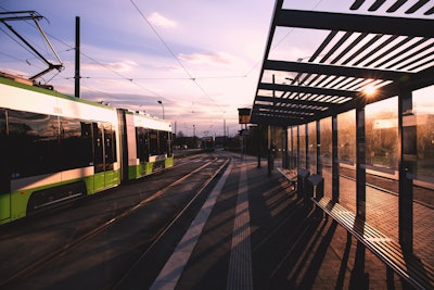 Green And White Train Near Train Terminal During Daytime 90550