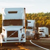White Volvo Semi Truck On Side Of Road 2199293 (1)