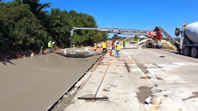 Realm Construction used the 24-ft.-wide custom Curb Roller drum to pour 400 to 450 linear feet of concrete a day and finished the project more than one week ahead of schedule.
