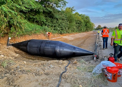 For the ditch liner project, Curb Roller Manufacturing created a custom flume drum measuring 24 ft. wide, 1,000 lbs. and 52 in. in diameter. Each wing section of the drum was 8 ft. wide, with an 8-ft. flat pan section in the middle.