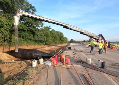 The team modified the Telebelt telescopic belt conveyor to lay the concrete in front of the tube and began pouring the MoDOT hand-finished concrete paving mix with a predetermined slump calculation.