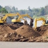 Excavators At Jobsite Freedigitalphotos
