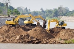 Excavators At Jobsite Freedigitalphotos