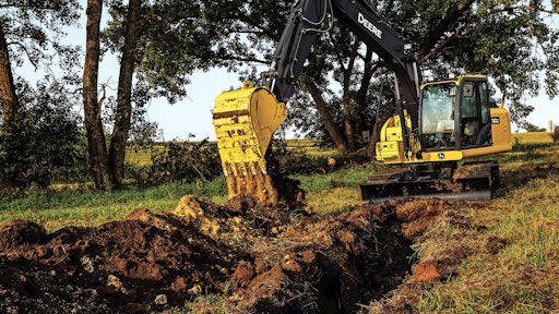 If you have to dig a trench while on a slope, be aware of the boom and arm position. When swinging, bring the boom and arm in fairly close to the machine. When coming out of the hole, bring the mast in toward the machine so the swing torque will allow the machine to swing.