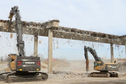Greg Bair Track Hoe Services Inc. used a Volvo EC750E HR and a EC480D high-reach demolition excavator working side by side to demolish the two bridges in a very tight time frame.