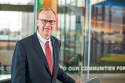 Richard M. Olson, Chairman and CEO