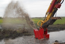 Great Lakes Dredge & Dock Company’s Rivers and Lakes Division used the Ditch Doctor from Ransome Attachments to maintain sediment-filled ditches and pockets of connecting standing water on a large dredging project in Argenta, IL.