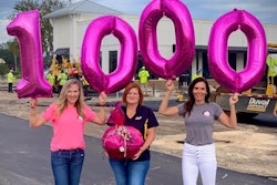 Amy Miller (L) and Natasha Ozybko (R) surprising WofA’s 1,000th member Marsha Johnson (C) at her jobsite.