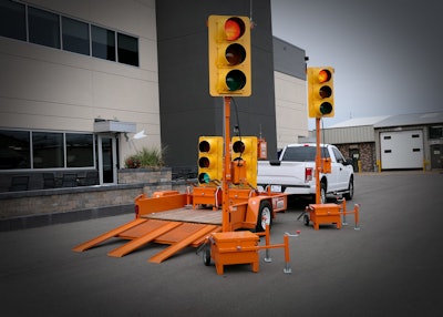Branz Technologies, Inc.’s Hook & Go Portable Traffic Signal Systems loaded on a custom Felling FT-3 Utility Pan trailer