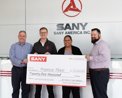 SANY America presented a check to Promise Place at its headquarters From left to right: Scott Beck, director of Human Resources for SANY America; Ben Miller, vice president of sales for construction equipment, SANY America; Vanessa Wilkins, executive director of Promise Place; and Nick Rider, Promise Place Board Chair