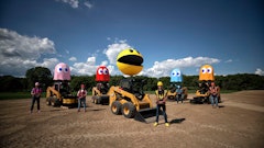 During the video, the five players race their machines around the exact 3D replica of the iconic PAC-MAN™ board to simulate gameplay of the original arcade game. The movement is all done through remote control operation far above the constructed maze, utilizing 236D3 Skid Steer loaders from The Cat Rental Store.