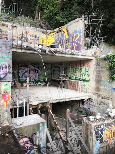 Demolition of the Lava House started on the roof of the garage and the Brokk 160 was used to steadily work down.