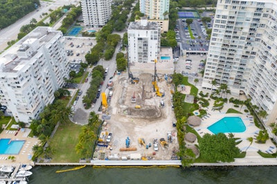 Following the building’s groundbreaking earlier this year, the construction team embarked on the deep-soil-mixing construction process to create a giant waterproof ‘bathtub’ that protects the building’s concrete mat above the tub from the groundwater and forms the base of the garage.