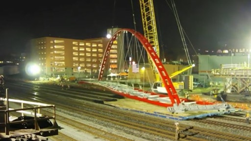 Crews recently hoisted a pedestrian-bicycle bridge into place in California.