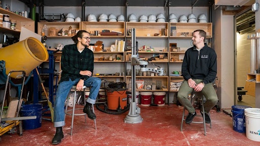 Sinan Husic (left) and Robin Papp (right) study low-carbon footprint building materials at Carleton University in Canada.