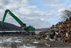 A Sennebogen 840 M was used on a power plant project in Ohio, where barge loading operations required a heavier machine with longer reach.