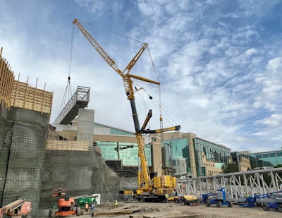 Wagstaff Crane Service uses LTM 1750-9.1 with upgrade kit to place pedestrian bridge at Huntsman Cancer Institute expansion.