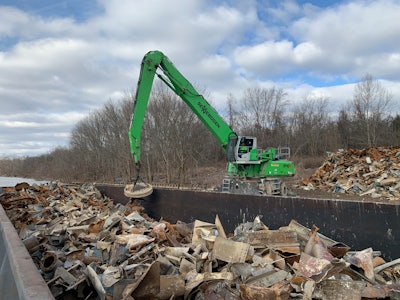 Adamo Group uses its Sennebogen material handlers with a magnet to pull rebar and other ferrous scrap from the piles of rubble, reducing landfilled material and adding an additional revenue stream.