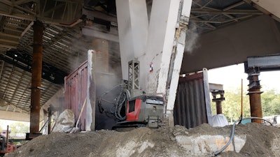 For precision and efficiency, the contractor used two Aquajet Aqua Cutter 710V robots to remove portions of 28 columns, four chevrons and one buttress in 30 days.
