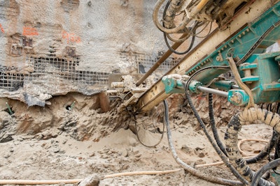 It took more than 2,000 15- to 50-ft.-long soil nails to complete Wall 4. The C7’s 30-ft. stroke allowed UMA to drill most holes with a single stroke.