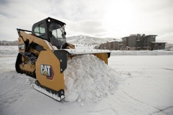 The first and most common method loaders are usually equipped for snow removal is is to push or scrape to clear the snow. This is done using a plow blade, a larger snow pusher and occasionally still a bucket. Snow pushers are wider and taller than a bucket, so they are capable of clearing more area quickly as shown by this Caterpillar 289D Compact Track Loader with a snow pusher.