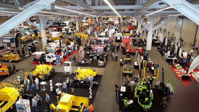 On the show floor in 2018, National Pavement Expo attendees are eager to network and visit.