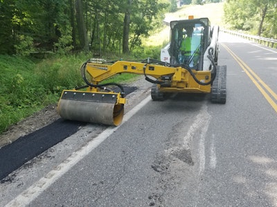 Relocating the compaction drum to an offset arm attachment maximizes safety. An operator can now drive the host machine on flat ground while the arm extends to the furthest, steepest edge of sloping road shoulders and ditches, while still being able to compact flat surfaces, too.
