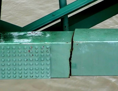 Traffic on the six-lane bridge was shut down May 11 after inspectors found a “significant fracture” in one of two 900-foot horizontal steel beams that are critical for the bridge’s integrity.