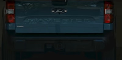 Leaked images of the pickups tailgate include a hybrid badge.