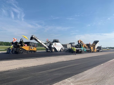 This photo was submitted by Andrew Taylor. Last month, the Shelly Company & Ebony Construction were working to pave in echelon at the Toledo Express Airport.