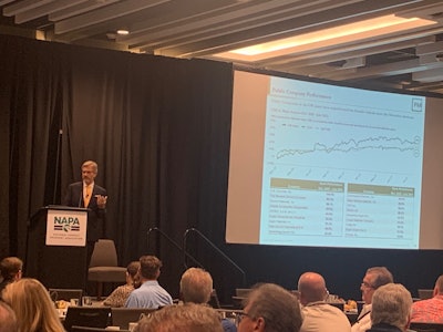 George Reddin, managing director at FMI Capital Advisors Inc., speaks to attendees of the National Asphalt Pavement Association mid-year meeting in Nashville.