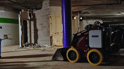 Because the noise and vibration of the renovation project had the potential to affect the church's sanctuary above, the battery-powered compact utility loader proved the ideal solution.