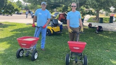 Scott Pevey of Ditch Witch and Andrew Heesacker of Arvada Rent-Alls pitch in with local volunteer effort