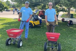 Scott Pevey of Ditch Witch and Andrew Heesacker of Arvada Rent-Alls pitch in with local volunteer effort
