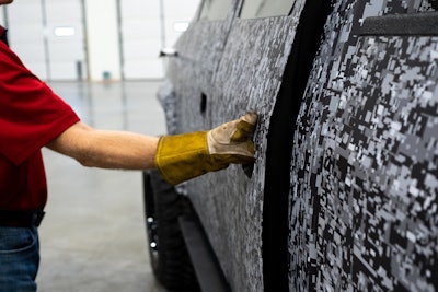 Extra-large door handles are integrated into the door panels with no moving mechanism to ensure durability and ease of use while wearing work gloves.