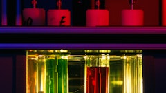 Oil viscosity is being tested in a lubricant lab.