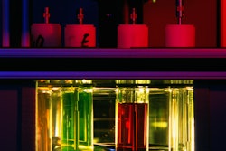 Oil viscosity is being tested in a lubricant lab.
