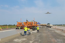 Atlantic Contracting and Material Co. Inc. were hired to pave both the Dulles International and Andrews Airforce Base at the same time. Causing them to purchase a fourth RexCon Model S concrete plant. They used a Guntert & Zimmerman S850 Quadra Bolster Concrete Slipform Paver.