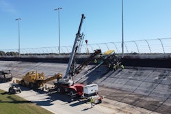 On these 28° banks, segregation is controlled with the feeder belt that fed the paver, a proprietary piece Sunmount developed to pave the high banks.