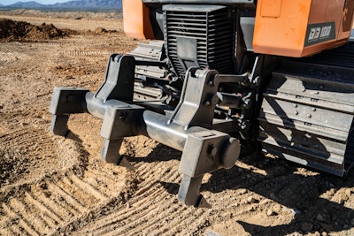 A parallel linkage rear ripper maintains the ripper shank angle of attack for easier operation.