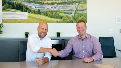 Dr. Tim Gerhardt (left) assumes the managing director role from Dr. Torben Reher, who served Liebherr USA, Co. since its inception in 2016.