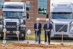 Volvo Group North America chairman and Mack Trucks president Martin Weissburg (right) and Volvo Financial Services president Marcio Pedroso (left) announced a $41 million investment to purchase and expand the building housing its U.S. Uptime Center.