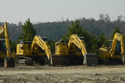 Excavators In A Row