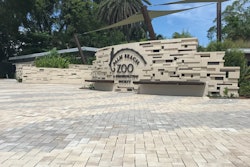 To create the pattern and control water runoff at the same time, Singer Studio chose Eco-Holland permeable pavers in Napoli and Aragon colors from Belgard.