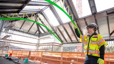 The Trimble XR10 with Microsoft HoloLens connects virtual reality to physical reality to provide mixed reality.